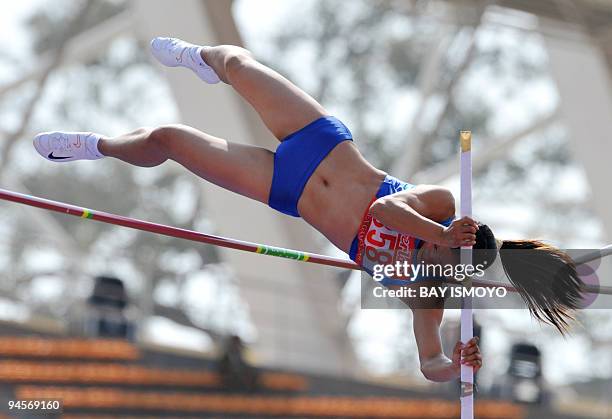 Le Thi Phuong of Vietnam competes in the women's pole vault athletics final at the 25th Southeast Asian Games in Vientiane on December 17, 2009....