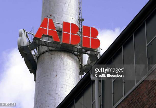 The ABB logo hangs on a smokestack at the ABB high-voltage products plant in Hanau, Germany, on Tuesday, Nov. 6, 2007. ABB Ltd. Is the world's...