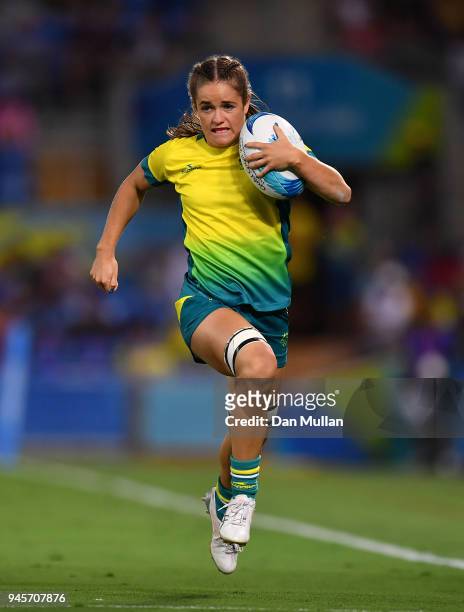 Dom du Toit of Australia makes a break during the Rugby Sevens Women's Pool B match between Australia and Wales on day nine of the Gold Coast 2018...