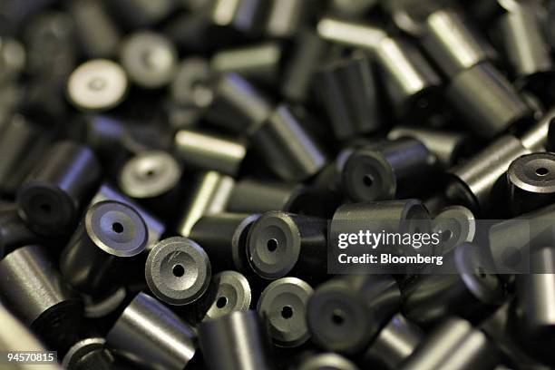 Uranium pellets cool in a tray after passing through a furnace inside the Ulba Metallurgical Plant in Ust-Kamenogorsk, Kazakhstan, on Tuesday, Oct....