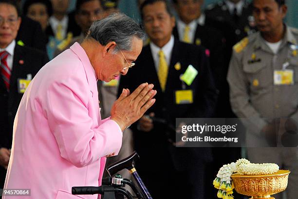 Bhumibol Adulyadej, the King of Thailand, greets a crowd of thousands of well wishers upon leaving a hospital in Bangkok, Thailand, on Wednesday,...