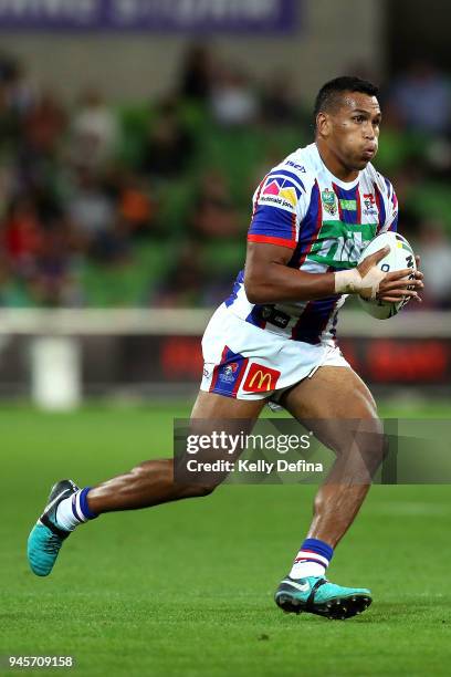 Herman Ese'ese of the Knights runs with the ball during the round six NRL match between the Melbourne Storm and the Newcastle Knights at AAMI Park on...