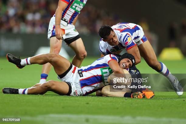Sione Mata'utia and Herman Ese'ese of the Knights in action during the round six NRL match between the Melbourne Storm and the Newcastle Knights at...