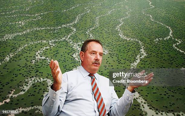 Don Mackay, chief executive officer of Australian Agricultural Co., gestures during an interview at his office in Brisbane, Australia, on Tuesday,...