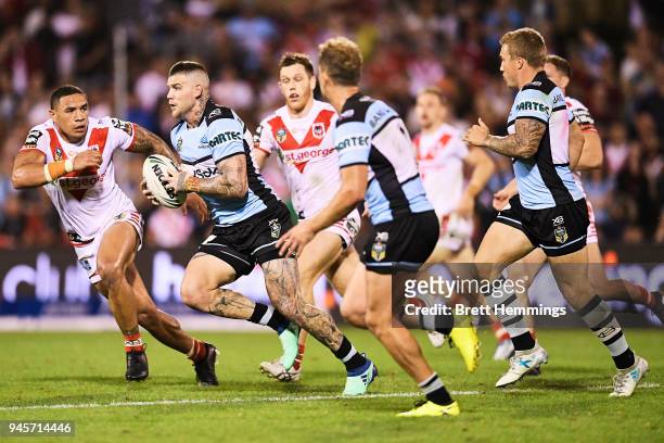 Joshua Dugan of the Sharks runs the ball during the round six NRL match between the St George Illawarra Dragons and the Cronulla Sharks at WIN...