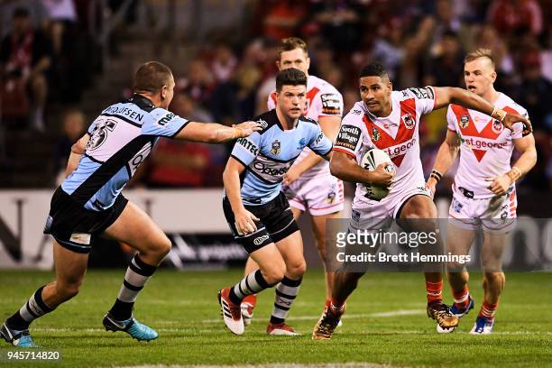 Nene MacDonald of the Dragons runs the ball during the round six NRL match between the St George Illawarra Dragons and the Cronulla Sharks at WIN...