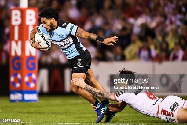 Ricky Leutele of the Sharks is tackled during the round six NRL match between the St George Illawarra Dragons and the Cronulla Sharks at WIN Stadium...