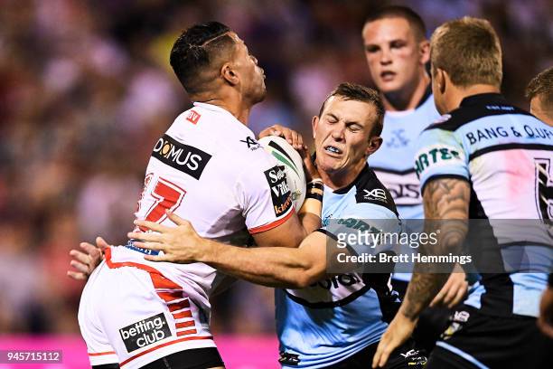 Hame Sele of the Dragons is tackled during the round six NRL match between the St George Illawarra Dragons and the Cronulla Sharks at WIN Stadium on...