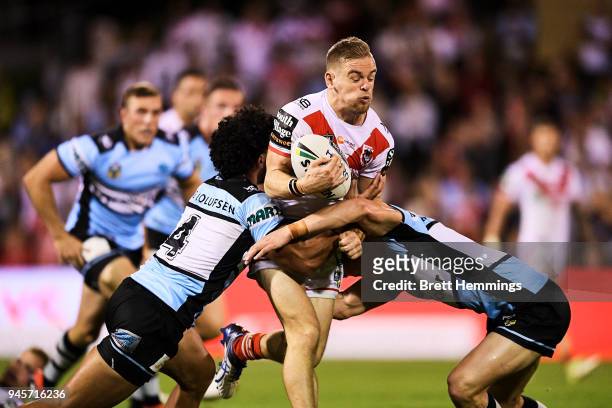 Matthew Dufty of the Dragons is tackled during the round six NRL match between the St George Illawarra Dragons and the Cronulla Sharks at WIN Stadium...