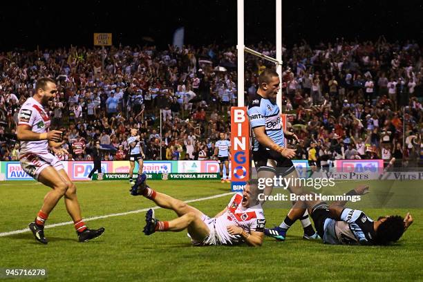 Matthew Dufty of the Dragons scores a try during the round six NRL match between the St George Illawarra Dragons and the Cronulla Sharks at WIN...