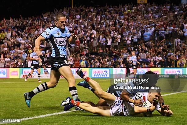 Matthew Dufty of the Dragons scores a try during the round six NRL match between the St George Illawarra Dragons and the Cronulla Sharks at WIN...