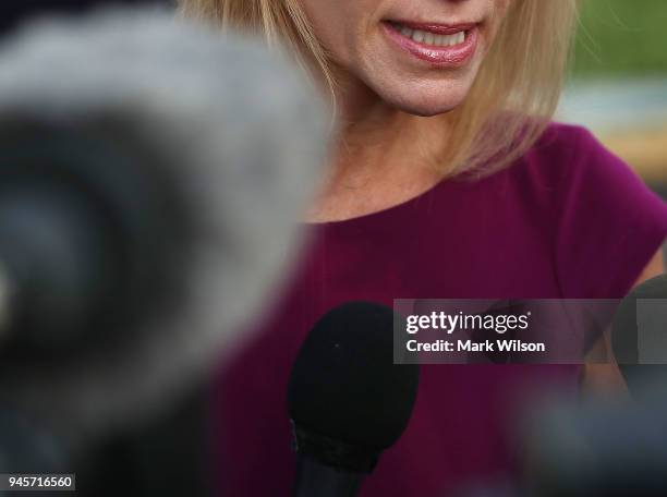 White House Counselor Kellyanne Conway speaks to reporters on the White House driveway after doing a television interview, on April 13, 2018 in...