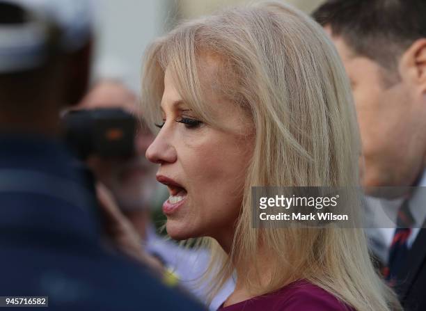 White House Counselor Kellyanne Conway speaks to reporters on the White House driveway after doing a television interview, on April 13, 2018 in...