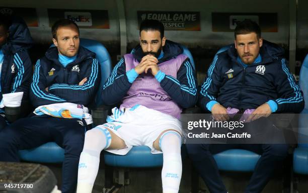 Valere Germain, Adil Rami, Gregory Sertic of OM seating on the bench during the UEFA Europa League quarter final leg two match between Olympique de...