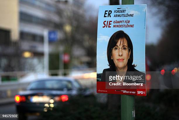 Campaign poster for Andrea Ypsilanti, top candidate of the Social Democrat Party for the upcoming elections in the German state of Hesse, hangs in...