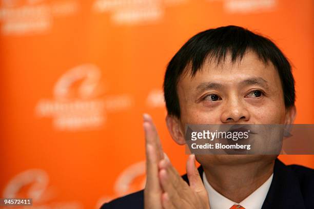 Jack Ma, chairman and chief executive officer of Alibaba Group, rubs his hands together at a news conference in Hong Kong, China, on Tuesday, Nov. 6,...
