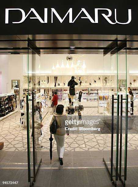 Shopper enters J. Front Retailing Co. 's Daimaru department store in the GranTokyo towers in Tokyo, Japan, on Tuesday, Nov. 6, 2007. J. Front...
