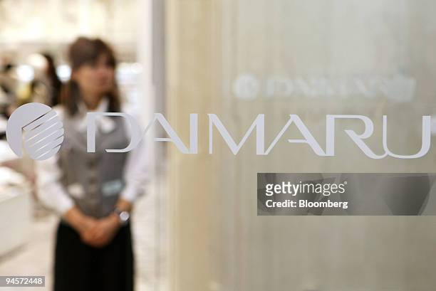 The logo is displayed on a door of J. Front Retailing Co. 's Daimaru department store in the GranTokyo towers in Tokyo, Japan, on Tuesday, Nov. 6,...