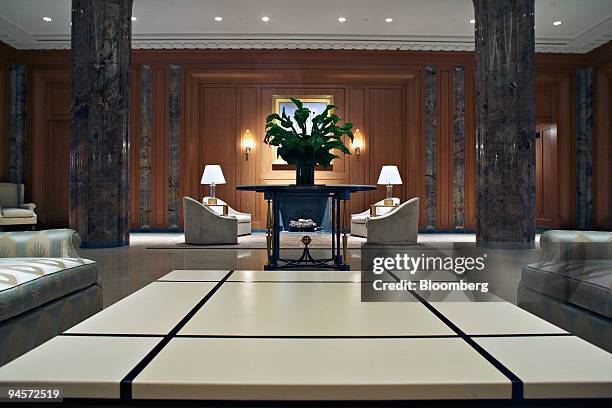 Plant sits on a table near seating areas in the lobby of 15 Central Park West, in New York, U.S., on Monday, Nov. 5, 2007.