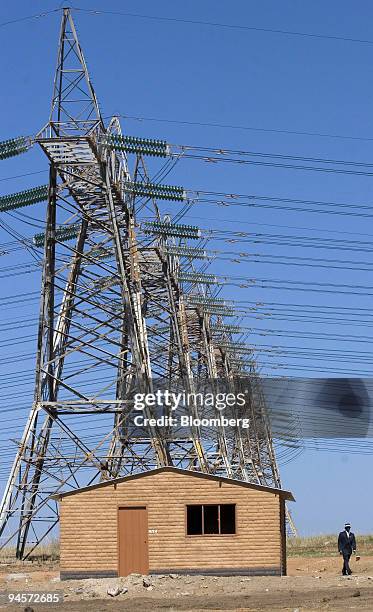 Electricity power lines from the Minerva sub station pass over the new low income housing estate at Olievenhoutbosch, Gauteng Province, in Pretoria,...