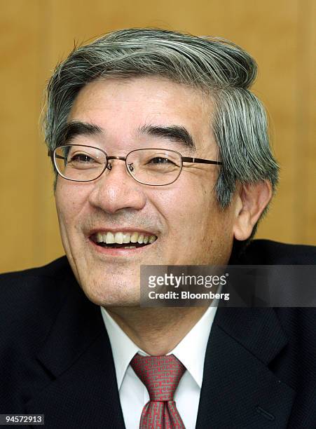 Masayuki Hirata, chief financial officer and senior executive vice president of NTT DoCoMo Inc., smiles during an interview in Tokyo, Japan, on...