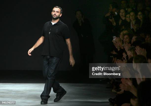 Italian designer Ricardo Tisci salutes the audience at the end of his Spring/Summer 2008 presentation for Givenchy in Paris, France, on Tuesday, Jan....