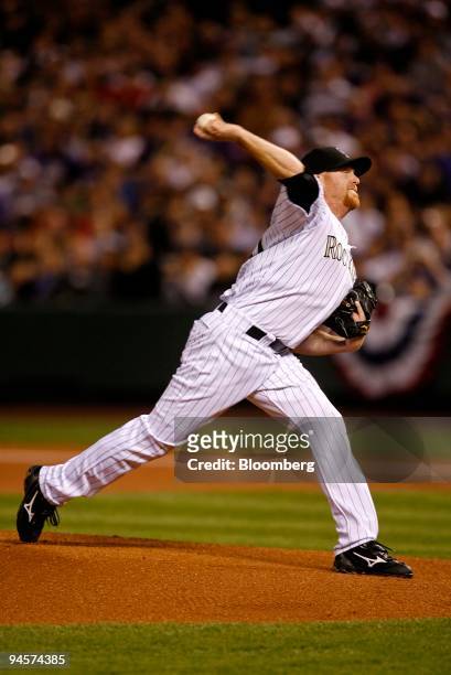 Aaron Cook of the Colorado Rockies pitches against the Boston Red Sox during Game 4 of the Major League Baseball World Series against hte Boston Red...
