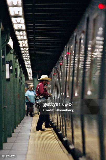 Passenger boards a train, Wednesday, July 25 in the Union Square subway station in New York. New York's Metropolitan Transportation Authority, which...