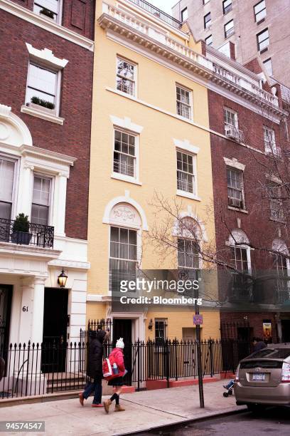 Pedestrian's walk past the townhouse of Lawrence Salander on East 82nd Street between Madison and Park Avenues in the Upper East Side neighborhood of...