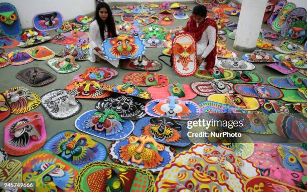 Fine arts students at Dhaka University busy making last minute preparations on 13 April 2108 ahead of the first day of the Boishakh to be celebrated...