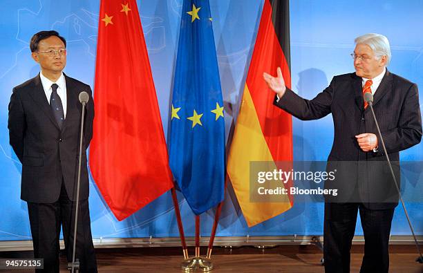 Frank-Walter Steinmeier, Germany's foreign minister, right, gestures to Yang Jiechi, China's foreign minister, in the Foreign Ministry in Berlin,...