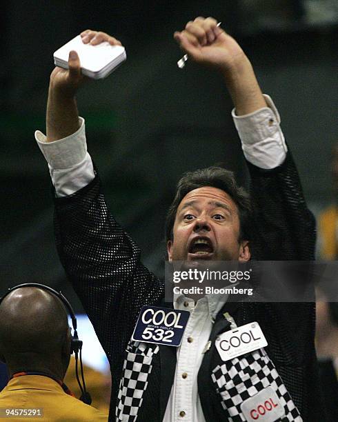 Trader Bryan Cooley works in the S&P pit on the floor of the Chicago Mercantile Exchange, CME Group, in Chicago, Illinois, Tuesday, July 24, 2007....