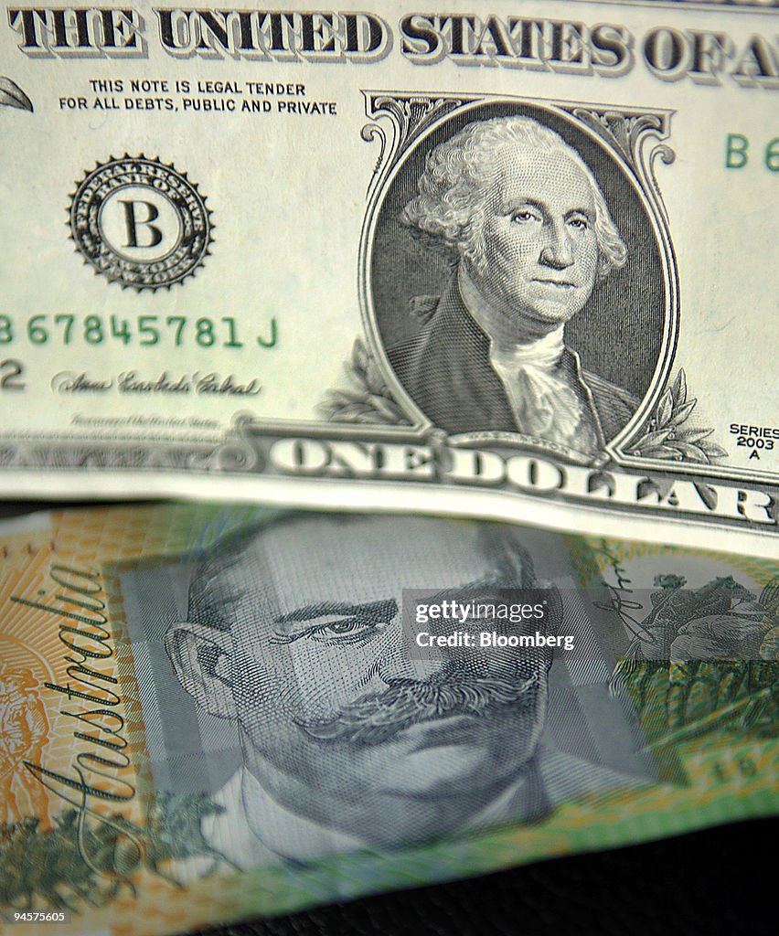 An Australian one-hundred-dollar note is displayed against a