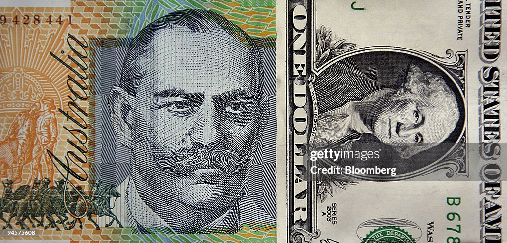 An Australian one-hundred-dollar note is displayed against a