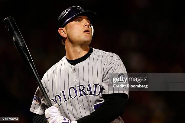 Matt Holliday of the Colorado Rockies pauses before batting against Curt Schilling of the Boston Red Sox during Game 2 of the Major League Baseball...
