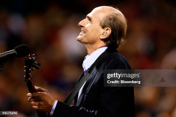 Recording artist James Taylor performs the National Anthem before Game 2 of the Major League Baseball World Series between the Colorado Rockies and...