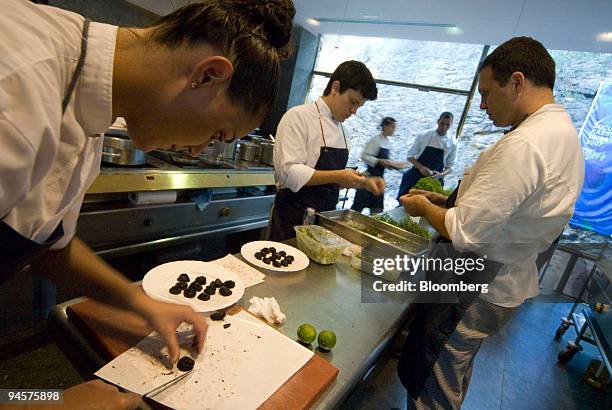 Chefs prepare food in the kitchen of ''El Bulli'' restaurant in Roses, Spain, on Wednesday, 18 July, 2007. The cooking at El Bulli is pioneering. It...
