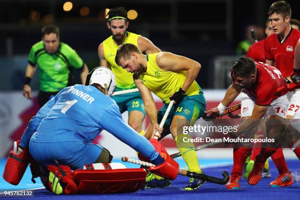 Goalkeeper, George Pinner of England saves from Aaron Kleinschmidt of Australia during Men's Semifinal match between Australia and England on day...