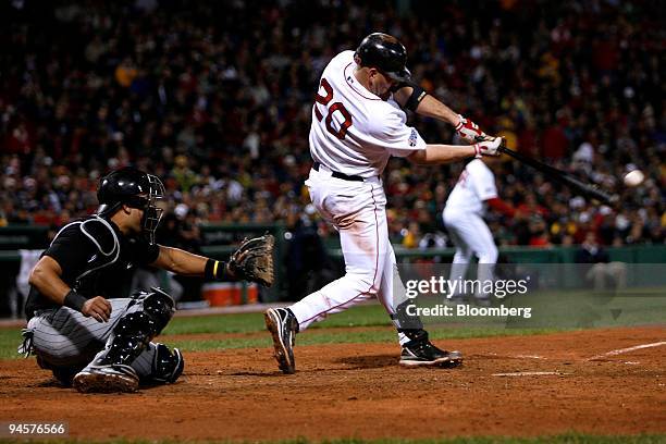 Kevin Youkilis of the Boston Red Sox bats against the Colorado Rockies during Game 1 of the Major League Baseball World Series at Fenway Park in...