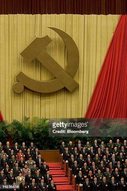 Delegates attend the opening session of the 17th Communist Party Congress in Beijing, China, on Monday, Oct. 15, 2007. Chinese President Hu Jintao...
