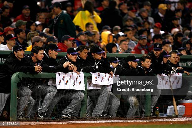 Members of the Colorado Rockies look on during Game 1 of the Major League Baseball World Series against the Boston Red Sox at Fenway Park in Boston,...