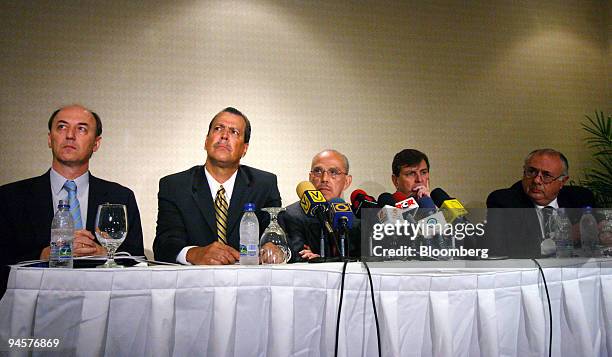 Members of the Inter American Press Association, from left, Press Freedom Director Ricardo Trotti, Chairman of the Committee on Freedom of the Press...