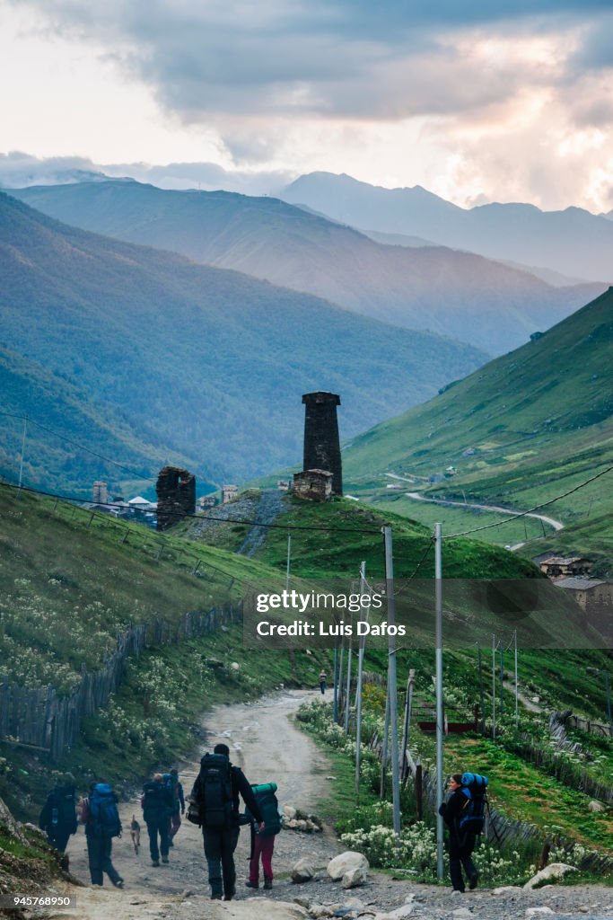 Hikers in Ushguli at dusk