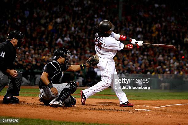Manny Ramirez of the Boston Red Sox bats against the Colorado Rockies during Game 1 of the Major League Baseball World Series at Fenway Park in...