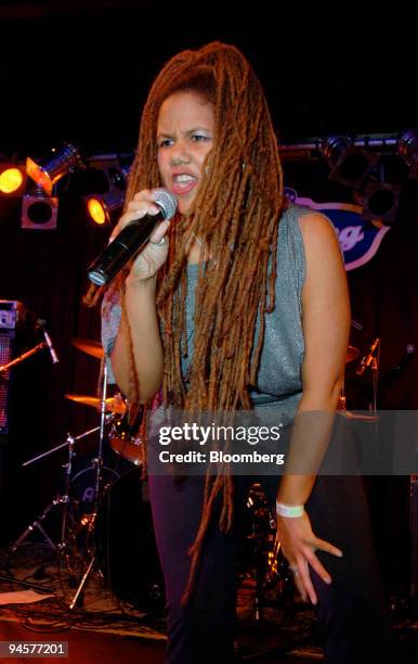 Carla Hall performs with Aged Inventory during the 4th annual Hedge Fund Rocktober Fest benefit concert at B.B. King Blues Club & Grill in New York,...