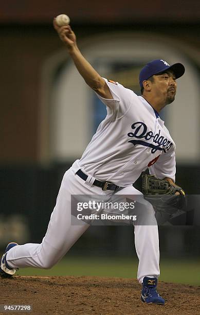 National League's Takashi Saito, of the Los Angeles Dodgers, pitches during the seventh inning of Major League Baseball's All-Star game in San...