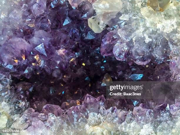 rock with amethyst - geode stock-fotos und bilder