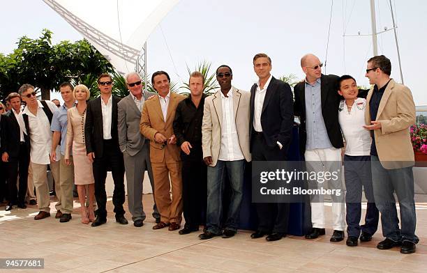Actors, from right, Eddie Jemison, Shaobo Qin, Director Steven Soderbergh, George Clooney, Don Cheadle, Scott Caan, Andy Garcia, Producer Jerry...