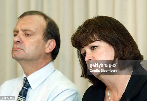 Bill Hawker, left, along with his wife Julia Hawker, listens to questions during a news conference at the British Embassy in Tokyo, Japan, on Friday,...