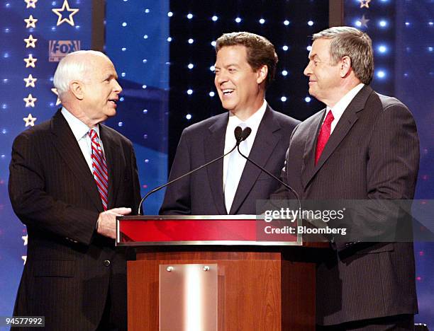 Republican presidential candidates, from left to right, Senator John McCain of Arizona, Senator Sam Brownback of Kansas, U.S. Representative Duncan...